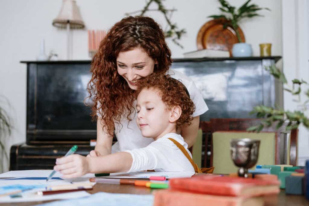mom and child drawing together