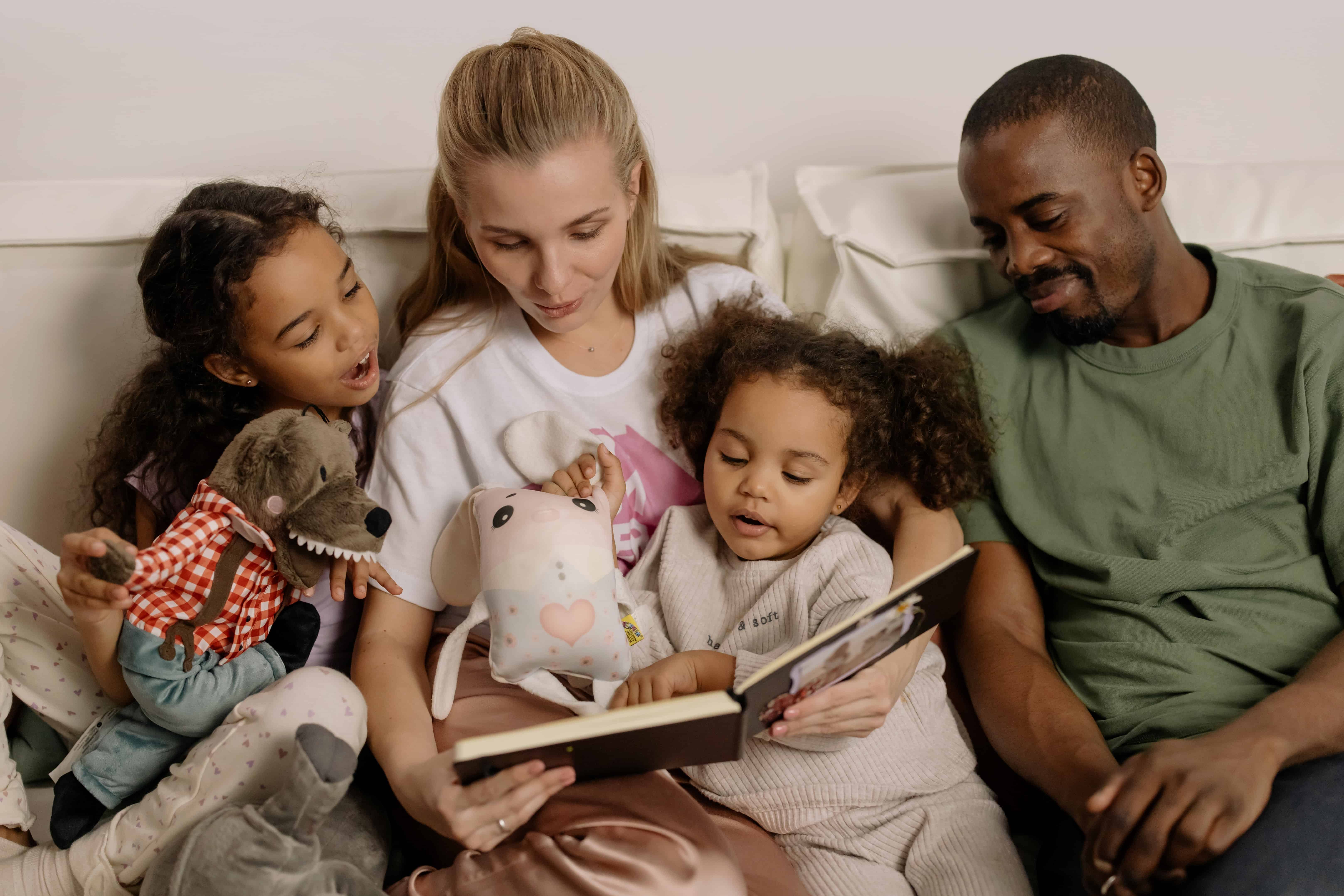 family reading together on the couch